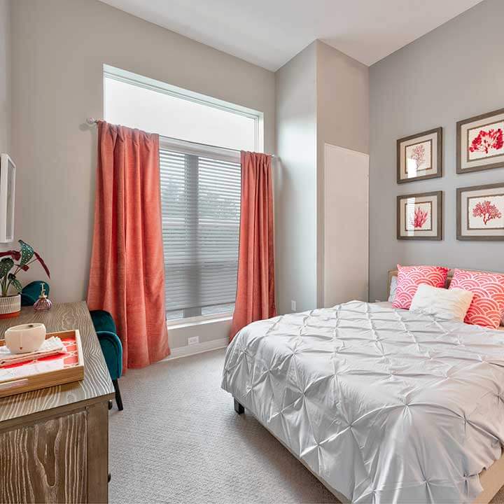 Heartis Venice apartment bedroom with king bed and dresser drawers